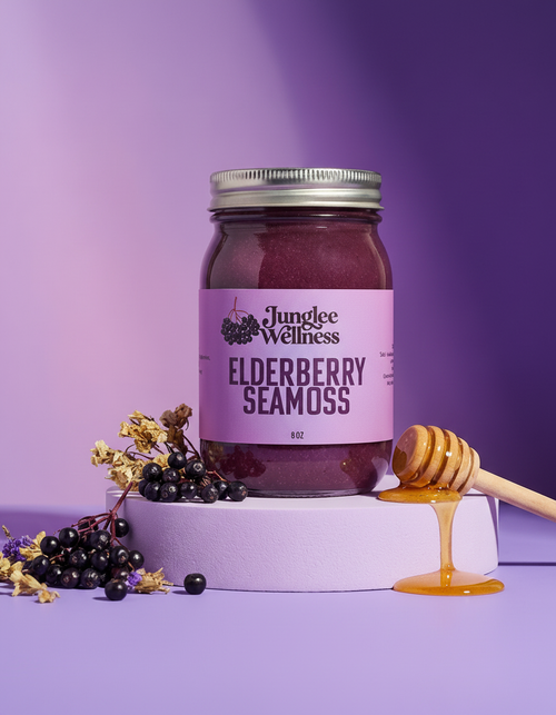 Jungle Wellness Elderberry Seamoss jar with honey and berries on a purple background